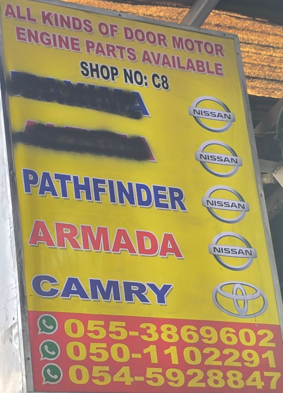 Banner photographed at Nissan, Toyota, Mitsubishi stall of DAR AL FARAH USED USED AUTO SPARE PARTS