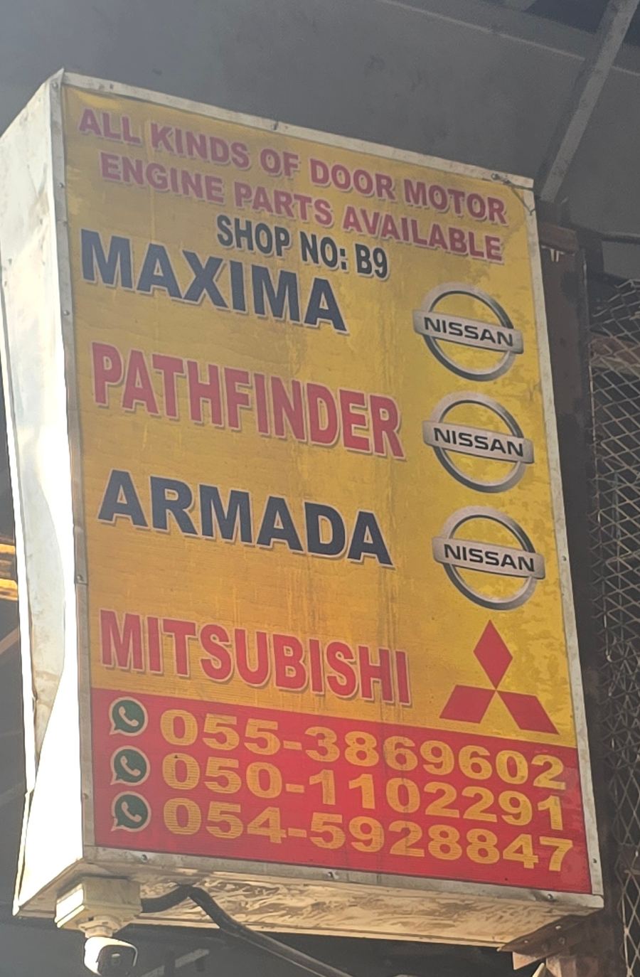 Banner photographed at Nissan, Toyota, Mitsubishi stall of DAR AL FARAH USED USED AUTO SPARE PARTS