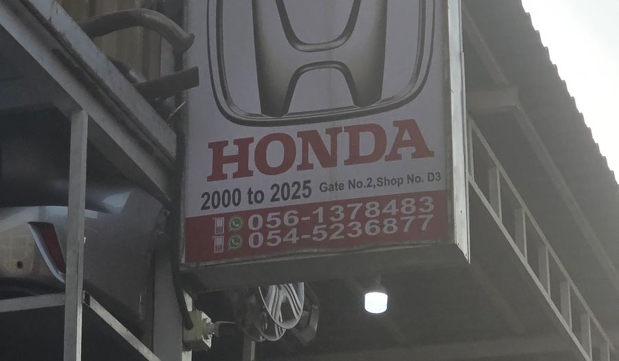 Banner photographed at Honda stall of ZAWEYAT AL ITEFAQ USED AUTO. SPARE PARTS