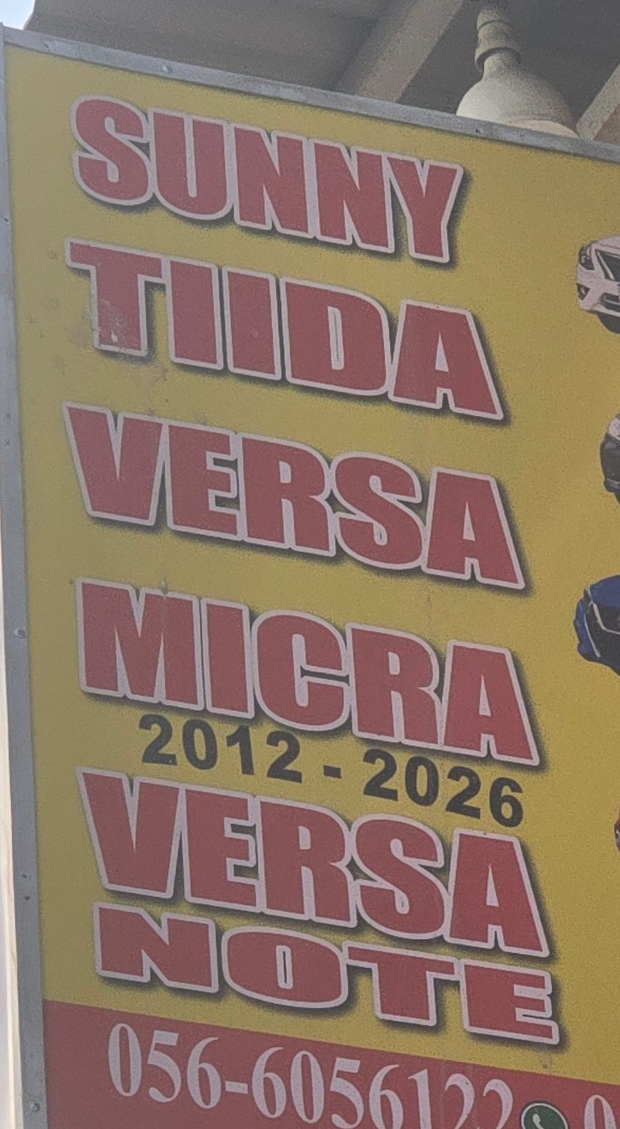 Banner photographed at Nissan stall of ZAWEYAT AL ITEFAQ USED AUTO. SPARE PARTS