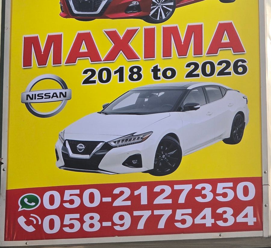Banner photographed at Nissan stall of SOUT AL MUHARAK USED AUTO SPARE PARTS