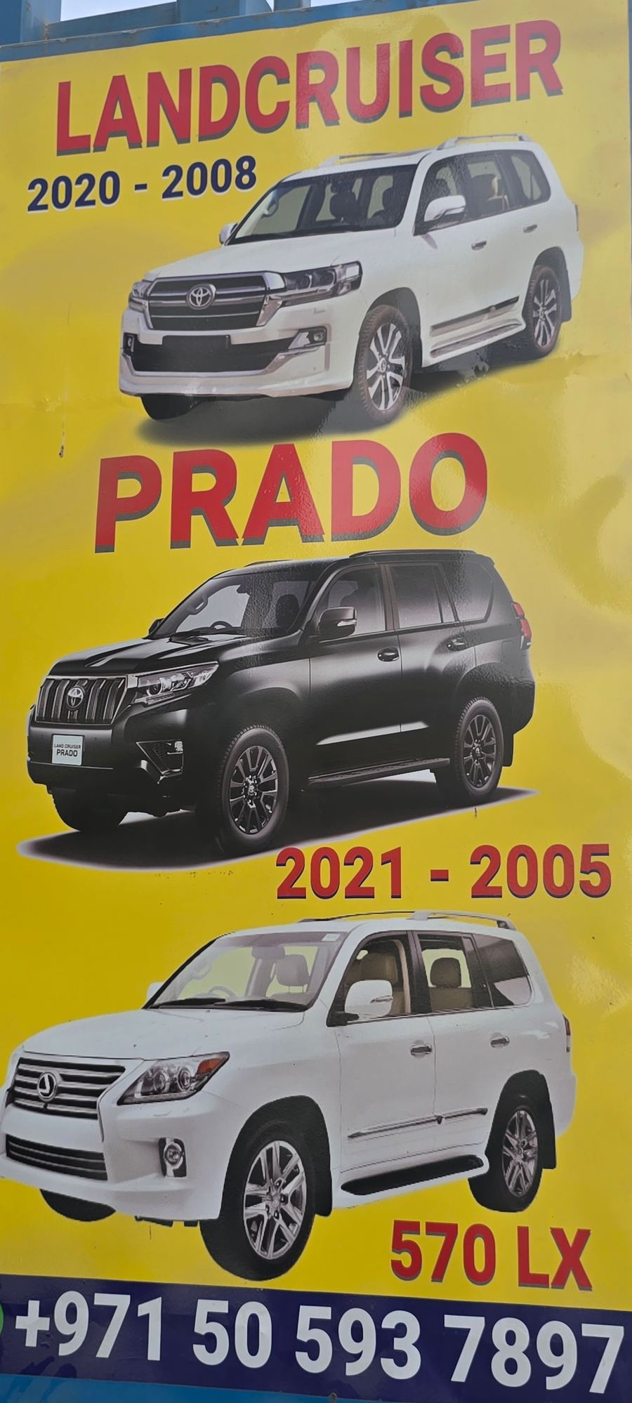 Banner photographed at Toyota stall of RAHMAN WALI USED CARS & SPARE PARTS