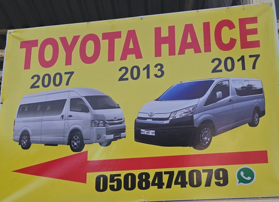 Banner photographed at Toyota stall of AL BAHAR AL MAFTOOH USED AUTO SPARE PARTS