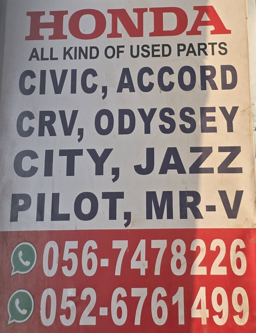 Banner photographed at Honda stall of DAR AL FARAH USED USED AUTO SPARE PARTS