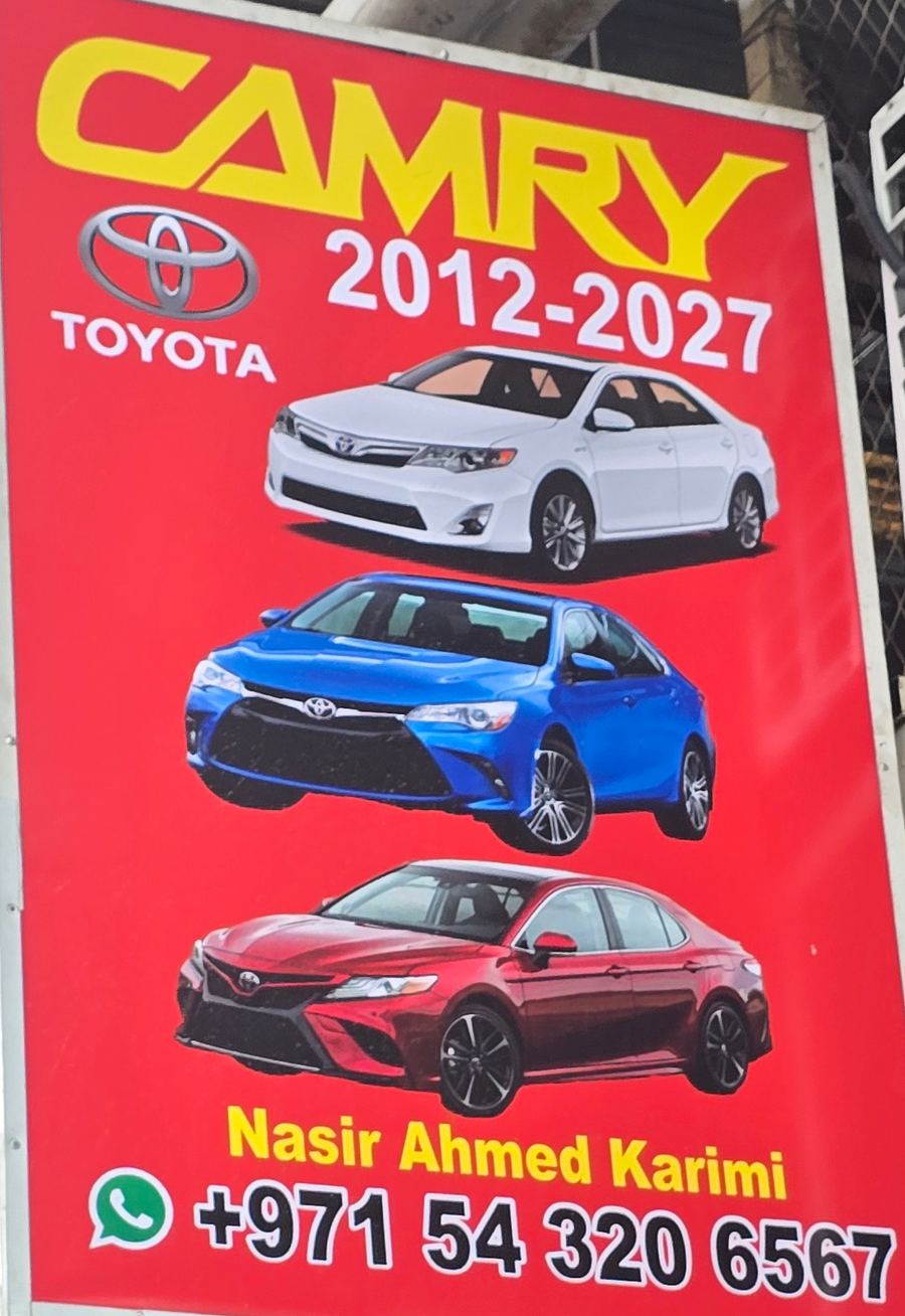 Banner photographed at Toyota stall of DAR AL FARAH USED USED AUTO SPARE PARTS